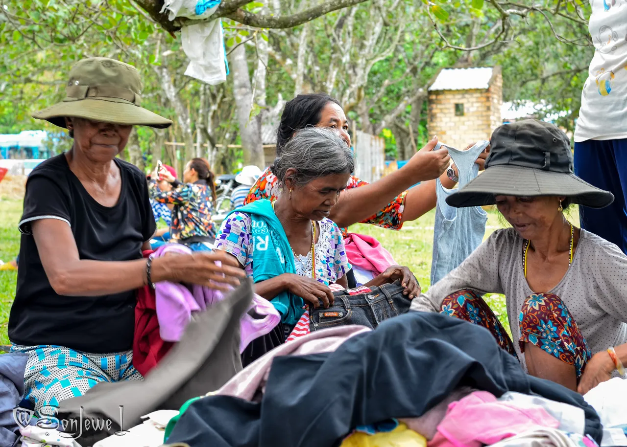 Y Tam collects clothes for ethnic minority villagers